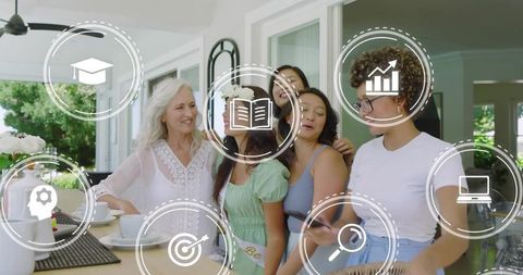 Multigenerational women celebrating at bright kitchen island, sharing phone and laughter