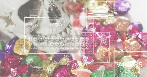 Assorted foil-wrapped candies and gummies displaying futuristic hud overlay