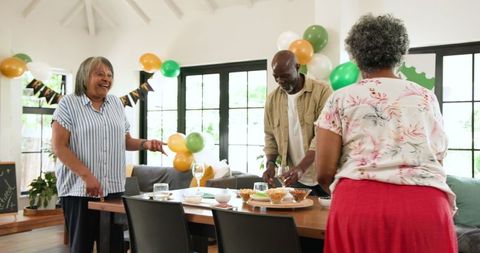 Senior Friends Celebrating Retirement with Laughter and Joy