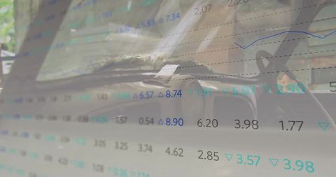 Automotive interior blended with financial data display overlays