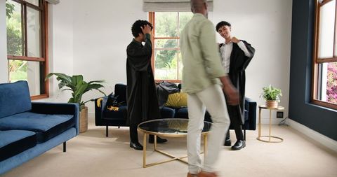 Diverse Family Celebrating Graduation Together at Home