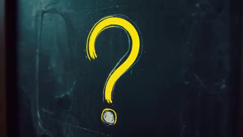 Yellow Chalk Question Mark on Dark Chalkboard Backdrop