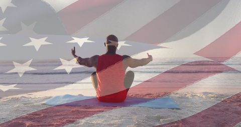 Reflecting on Freedom: Man Practicing Yoga on Beach with US Flag Overlay