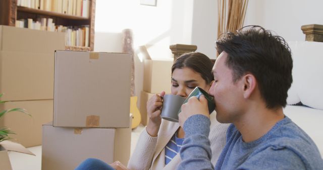 Young Couple Taking Break While Moving House with Cardboard Boxes - Download Free Stock Images Pikwizard.com