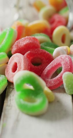 Colorful Jelly Candy Spilling from Glass Jar on Wooden Table - Download Free Stock Images Pikwizard.com