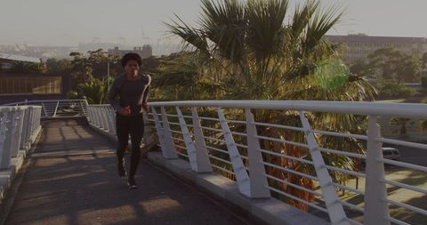 Healthy Lifestyle: Man Running on Urban Bridge - Download Free Stock Images Pikwizard.com