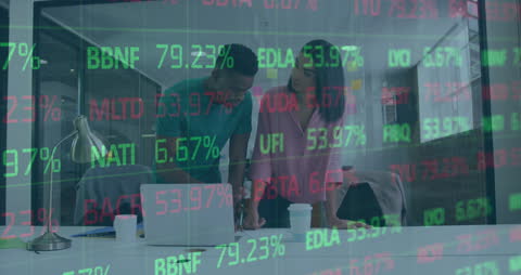 Business Colleagues Discussing Market Data with Overlay of Stock Prices