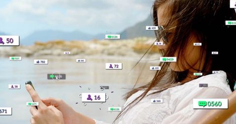 Woman by lakeside scrolling smartphone with notifications overlay