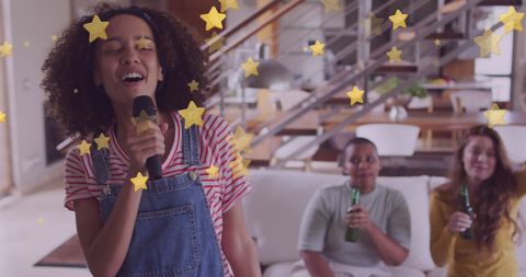 Young woman singing karaoke friends enjoying music night