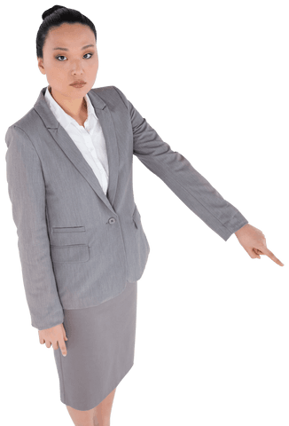 Serious asian businesswoman pointing with authority