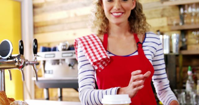 Smiling Barista Serving Coffee in Cafe - Download Free Stock Images Pikwizard.com