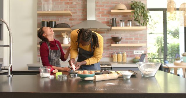 Couple Baking Together in Modern Kitchen, Laughing and Enjoying - Download Free Stock Images Pikwizard.com