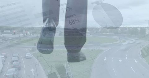 Businessman Overlooking Cityscape with Overlay of Statistical Data