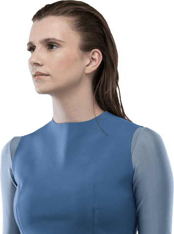 Beautiful Woman in Blue Dress Looking Transparent with Hair Slicked Back