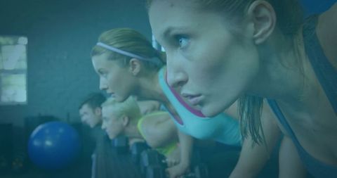 Diverse group strength training in modern gym