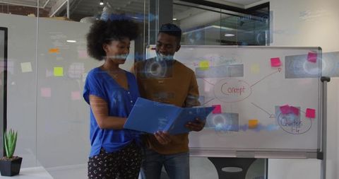 Two Professionals Collaborating with Blue Folder, Whiteboard Brainstorming in Modern Office