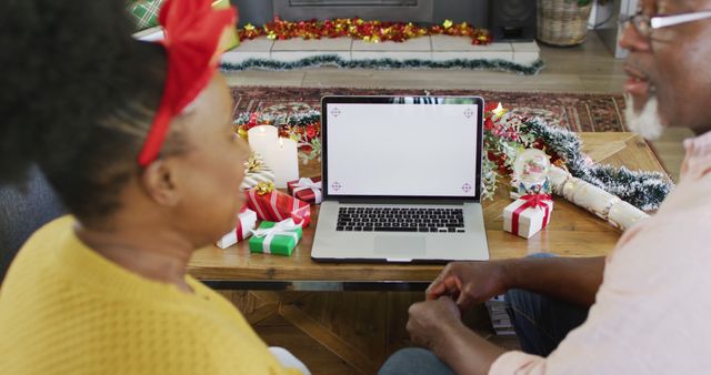 Senior Couple Enjoying Christmas Together At Home - Download Free Stock Images Pikwizard.com