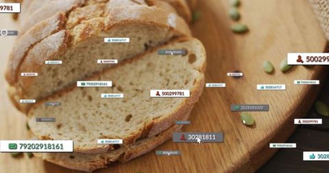 Rustic Artisan Bread with Digital Tags on Wooden Board