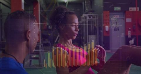 Female Athlete Performing Sit-Ups with Digital Data Overlay in Gym