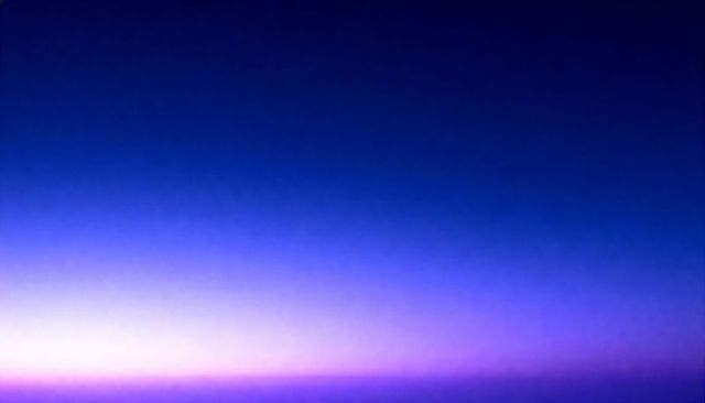 Glowing Twilight Gradient Sky Creating Calm Horizon in Deep Blue Violet
