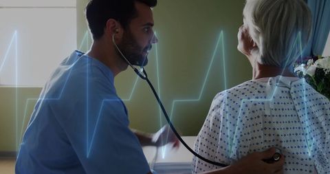 Healthcare innovation: doctor monitoring senior with digital cardiograph