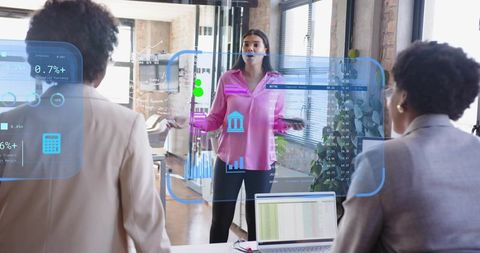 Businesswoman Presenting Digital Analytics in Modern Meeting Room