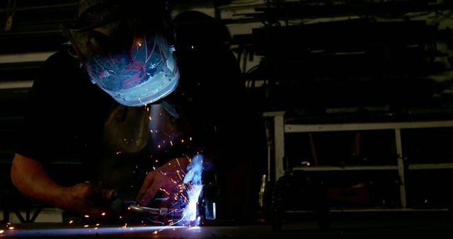 Welder Working with Protective Mask and Sparks - Download Free Stock Images Pikwizard.com