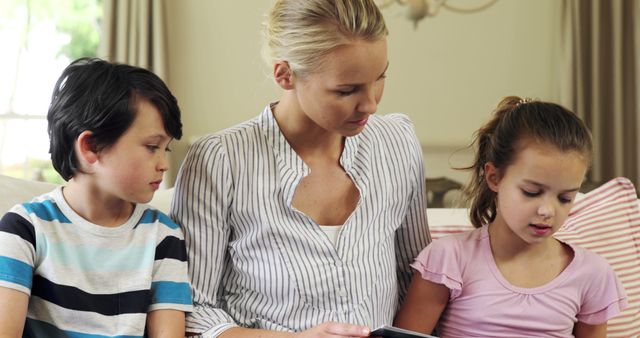 Mother Engaging Children in Educational Activity at Home - Download Free Stock Images Pikwizard.com