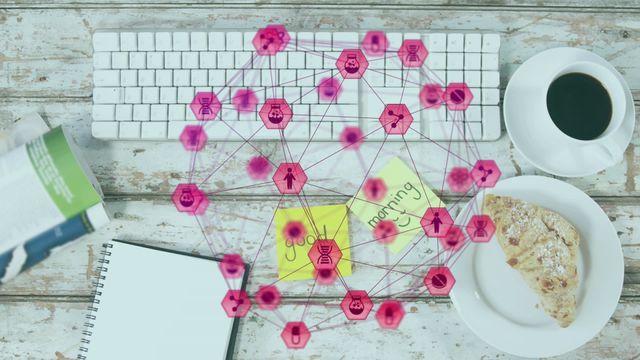 This video shows a top view of an office desk with various equipment including a keyboard, sticky notes, a notebook, coffee, and a croissant. Overlaying the desk is a digital network of connections and icons, symbolizing technology and communication. This video is perfect for presentations or articles related to technology, digital communication, office work, and remote working environments.