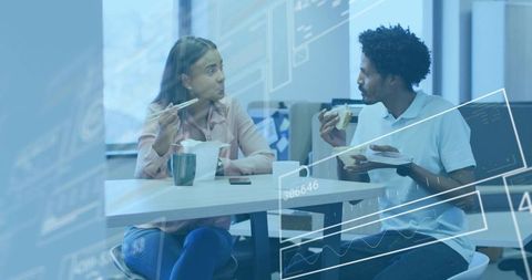 Colleagues enjoying modern office lunch break