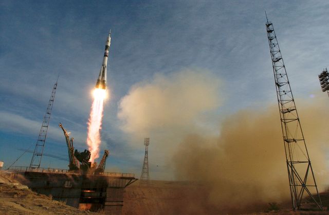 JSC2004-E-46229 (14 October 2004) --- The Soyuz TMA-5 spacecraft blasts off from the Baikonur Cosmodrome in Kazakhstan October 14, 2004, carrying astronaut Leroy Chiao, Expedition 10 commander and NASA Space Station science officer, cosmonaut Salizhan S. Sharipov, Russia&#0146;s Federal Space Agency flight engineer and Soyuz commander, and Russian Space Forces cosmonaut Yuri Shargin to the orbital outpost. The crew will dock to the Station on October 16, and Chiao and Sharipov will replace the current Station crewmembers, cosmonaut Gennady I. Padalka, Expedition 9 commander, and astronaut Edward M. (Mike) Fincke, NASA Space Station science officer and flight engineer, who will return to Earth October 24 with Shargin.  Photo Credit: NASA/Bill Ingalls