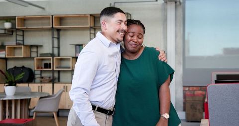 Colleagues Teamwork Embrace Celebrating Project Success