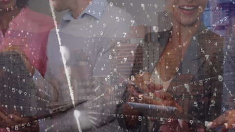 Diverse Business Team Engaged in Data Analysis with Technology