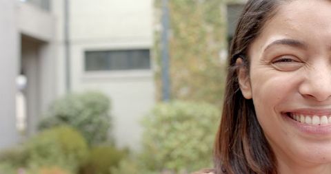 Cheerful Woman Smiling in Urban Environment - Download Free Stock Images Pikwizard.com