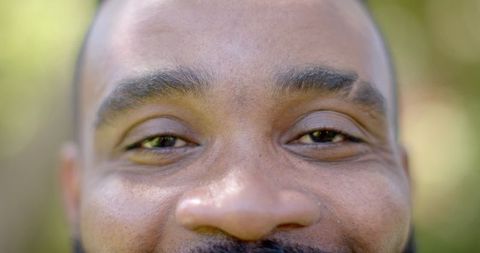 Expressive close-up of man's eyes with focused gaze