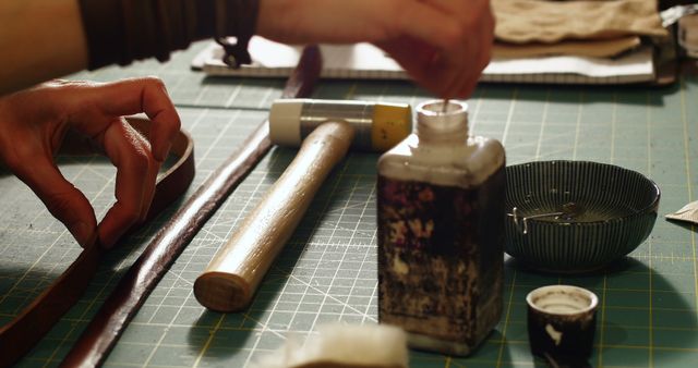 Close-Up of Hands Crafting Leather with Tools on Workbench - Download Free Stock Images Pikwizard.com