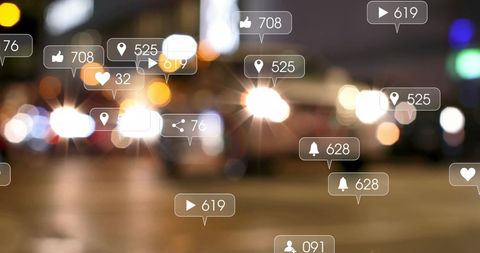 Social Media Icons Over Blurred Urban Nightlife