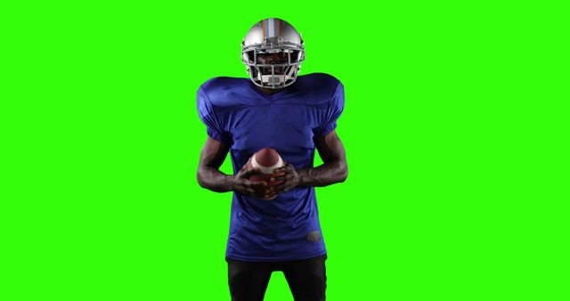 Professional Football Player Holding Ball on Green Screen Background - Download Free Stock Images Pikwizard.com