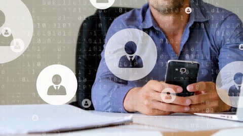 Businessman Interacting with Social Media Technology on Smartphone