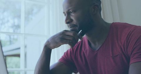 Focused professional working from home in cozy atmosphere