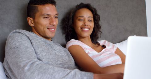 Young Couple Enjoying Relaxed Time at Home with Laptop - Download Free Stock Images Pikwizard.com