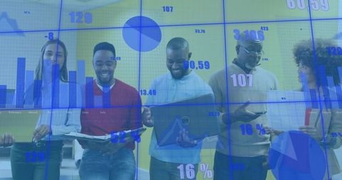 Diverse team analyzing digital dashboards and charts during collaborative office review