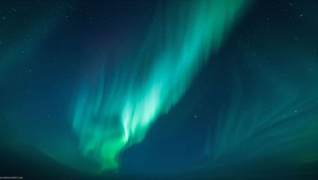 Spectacular aurora borealis with starry night sky