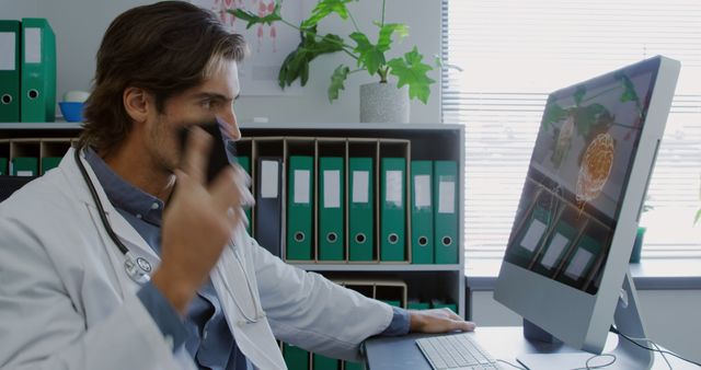 Doctor Consulting Patient via Video Call in Office - Download Free Stock Images Pikwizard.com