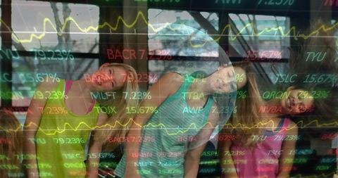 Group fitness class doing neck stretches with financial ticker overlay and trend lines