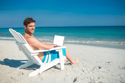 transparent laptop on beach with man relaxing in sun - Download Free Stock Videos Pikwizard.com