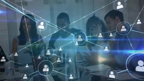 Team Collaborating Around Holographic Interface in Modern Office