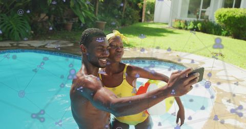 Cheerful African American Couple Taking Poolside Selfie with Social Media Overlay
