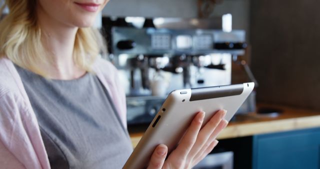 Businesswoman Using Digital Tablet in Cafe - Download Free Stock Images Pikwizard.com