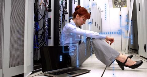 IT Engineer Analyzing Data in a Server Room Environment - Download Free Stock Images Pikwizard.com